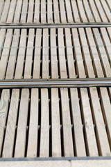 Tram rails and wooden slats at tram stop in Bordeaux, France