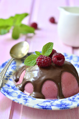 Raspberry pannacotta with chocolate.