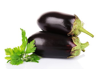Fresh eggplant with parsley isolated on white