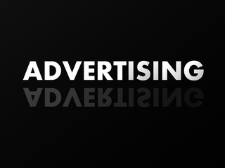 The word ADVERTISING in mirror reflection on black background.