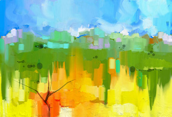 Abstract colorful oil painting landscape on canvas. Semi- abstract image of tree in yellow and green field with blue sky.Spring season nature background