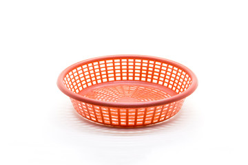 Small plastic basket isolated on a white background