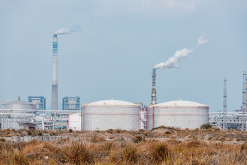 big Industrial oil tanks in a refinery