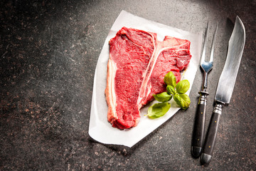 Fototapeta na wymiar Raw fresh meat T-bone steak