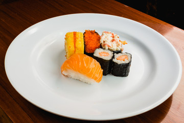 Five Sushi on white dish