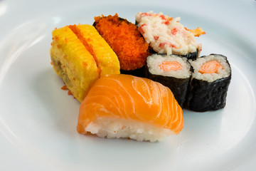 Five Sushi on white dish