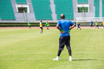 Goal keeper waiting , back view