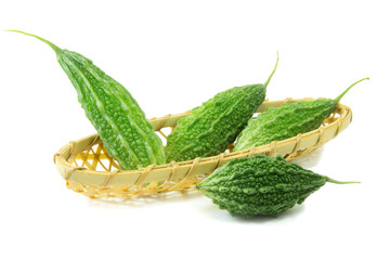 Balsam pear in basket on white background
