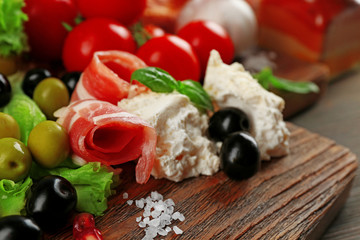 Ingredients of Mediterranean cuisine, on wooden board, close-up