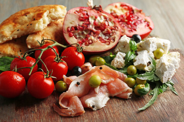 Ingredients of Mediterranean cuisine, on wooden board background