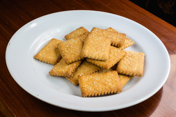 Cookie with sugar on white dish