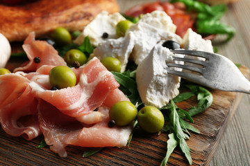 Ingredients of Mediterranean cuisine, on wooden background