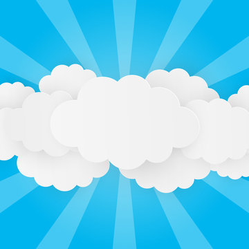 Paper clouds on blue background