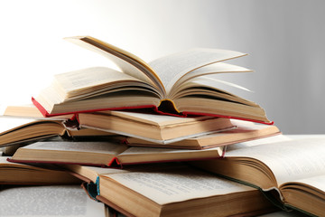 Many open books isolated on white