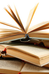 Many open books isolated on white