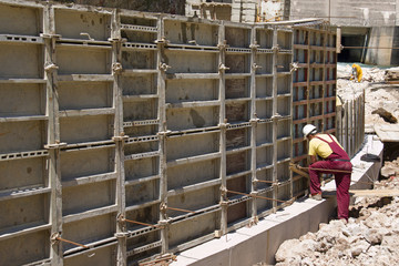 Working with prefabricated formwork on construction site