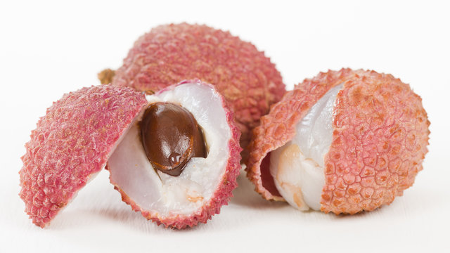 Lychees - Fresh lychees o a white background.
