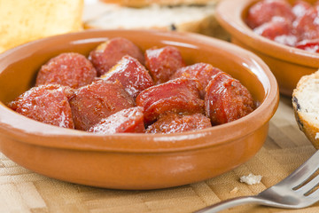 Chorizo a la Sidra - Spanish spicy chorizo sausages cooked in cider.
