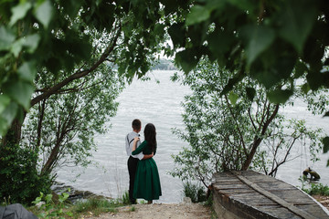 Fototapeta premium man and woman at the lake