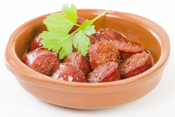 Chorizo a la Sidra - Spanish spicy chorizo sausages cooked in cider.
