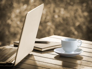 Laptop and Cup of coffee on desk