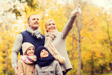 happy family in autumn park