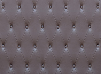 Pattern of brown leather seat upholstery