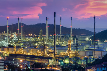 Obraz na płótnie Canvas Landscape of oil refinery industry with oil storage tank