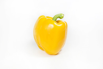 Yellow bell pepper on white