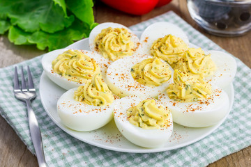 Spicy deviled eggs sprinkled with paprika