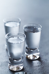Shot glasses of cold vodka
