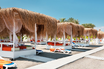 Canopies from the sun on a beach in Turkey © Stepan Bormotov