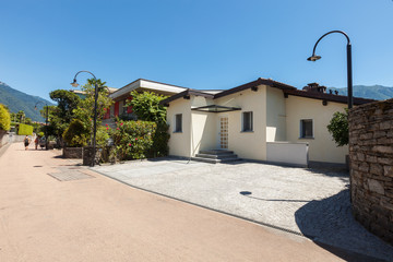 Fototapeta premium Modern house, view from the entrance on the road