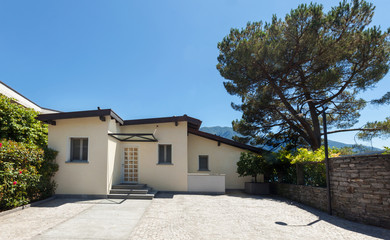 Modern house, view from the entrance on the road