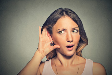 surprised nosy woman hand to ear gesture carefully secretly listening
