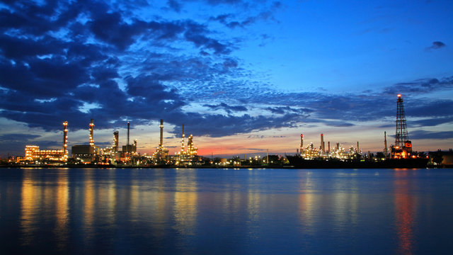 Bangchak oil refinery against twilight sky