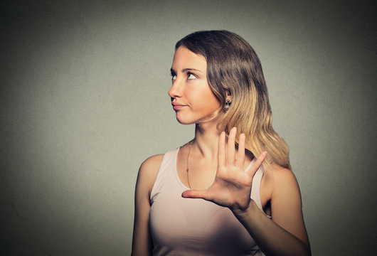 Annoyed Angry Woman With Bad Attitude Giving Talk To Hand Gesture