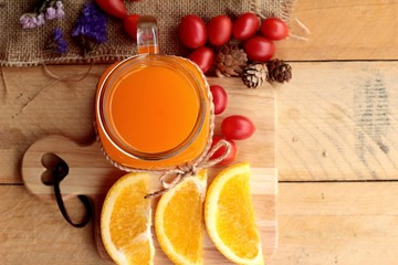 Orange juice with fresh orange fruits sliced.
