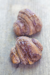 Mini chocolate croissant on wood table background