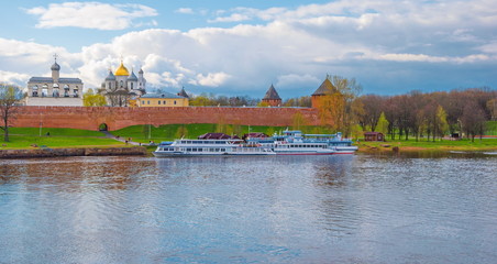 Obraz premium View of the embankment of the River Volkhov and the Kremlin with a bell tower in Veliky Novgorod
