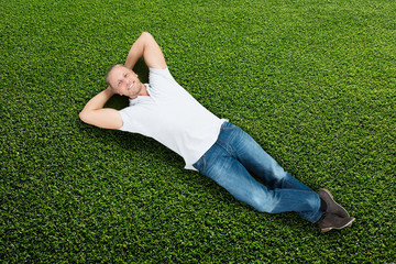 Man Lying On Grass