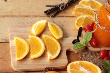 Orange juice with fresh orange fruits sliced.