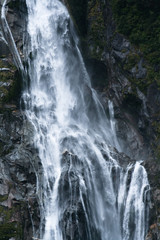Waterfall at milford sound, New Zealand