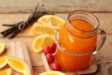 Orange juice with fresh orange fruits sliced.