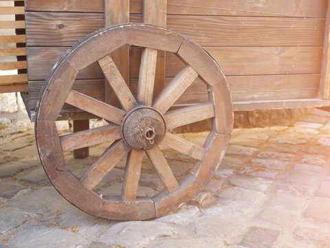 Wooden wheels on the cart.