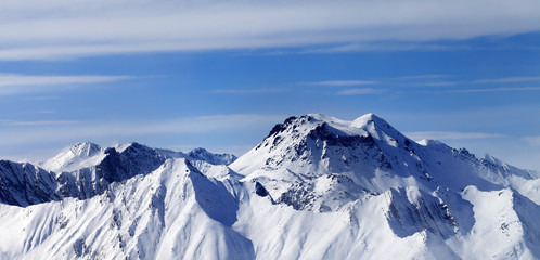 Fototapeta na wymiar Panoramic view on winter mountains in haze