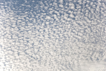 Tiny clouds on blue sky