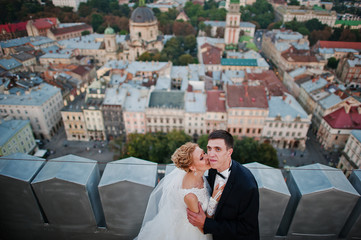 Panorama view from city Lviv tower with newlyweds