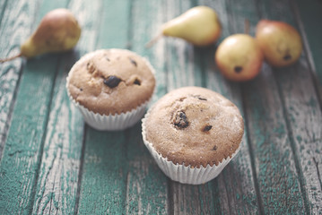 cake with pears on an old wooden table