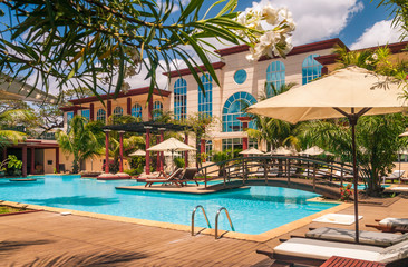 Swimmign pool of a luxury hotel - obrazy, fototapety, plakaty